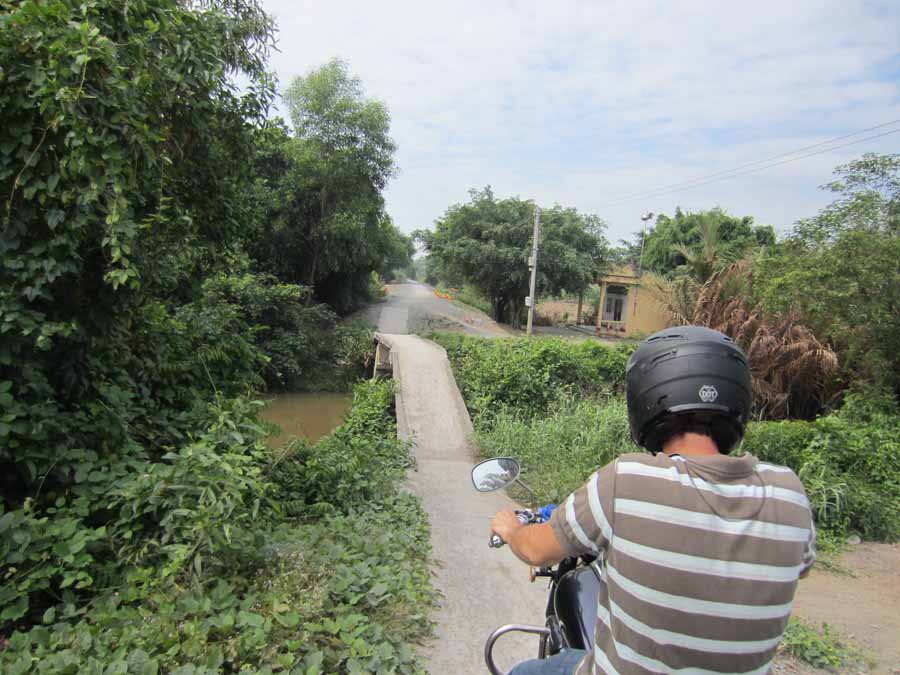 Motorbike riding through the county-side in Vietnam