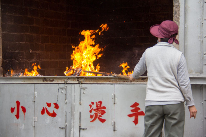 incense fire in Pai Tau, Hong Kong temple